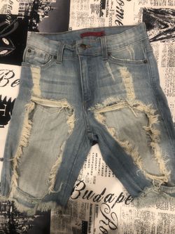 Ripped Shorts Above Knee