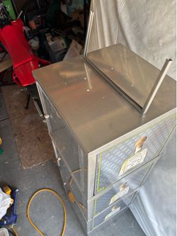 Metal cabinet good for alcohol or trophy