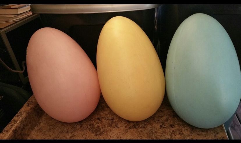 Easter Eggs 14 inch long. Good Condition. There are 3 . Yellow / Pink and Light blue $10 EACH
