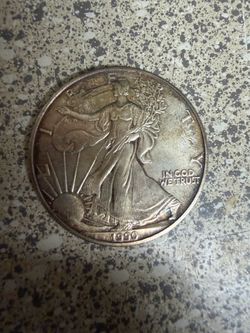 1990 1oz silver dollar