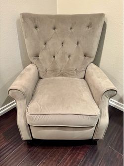 Lounge, chairs from ￼Pottery Barn high-back tufted swivel glider recliner upholstered in a microfiber, performance velvet fabric.