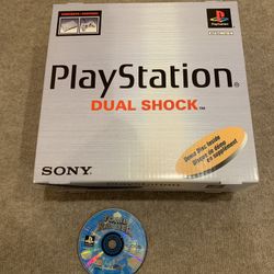 Original Sony PlayStation Classic with two Memory Cards and Tomb Raider CD/Game