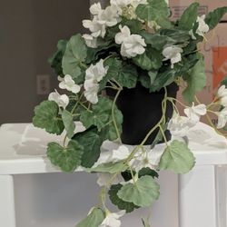 Faux Plant in Plastic Vase – A Touch of Green for Any Space