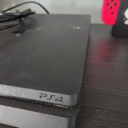 ps4 slim 2 controllers and games