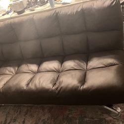 Brown leather couch/futon