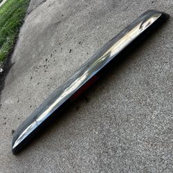 Rear Spoiler and Brake Light Assembly Off 2014 Dark Blue Dodge Minivan
