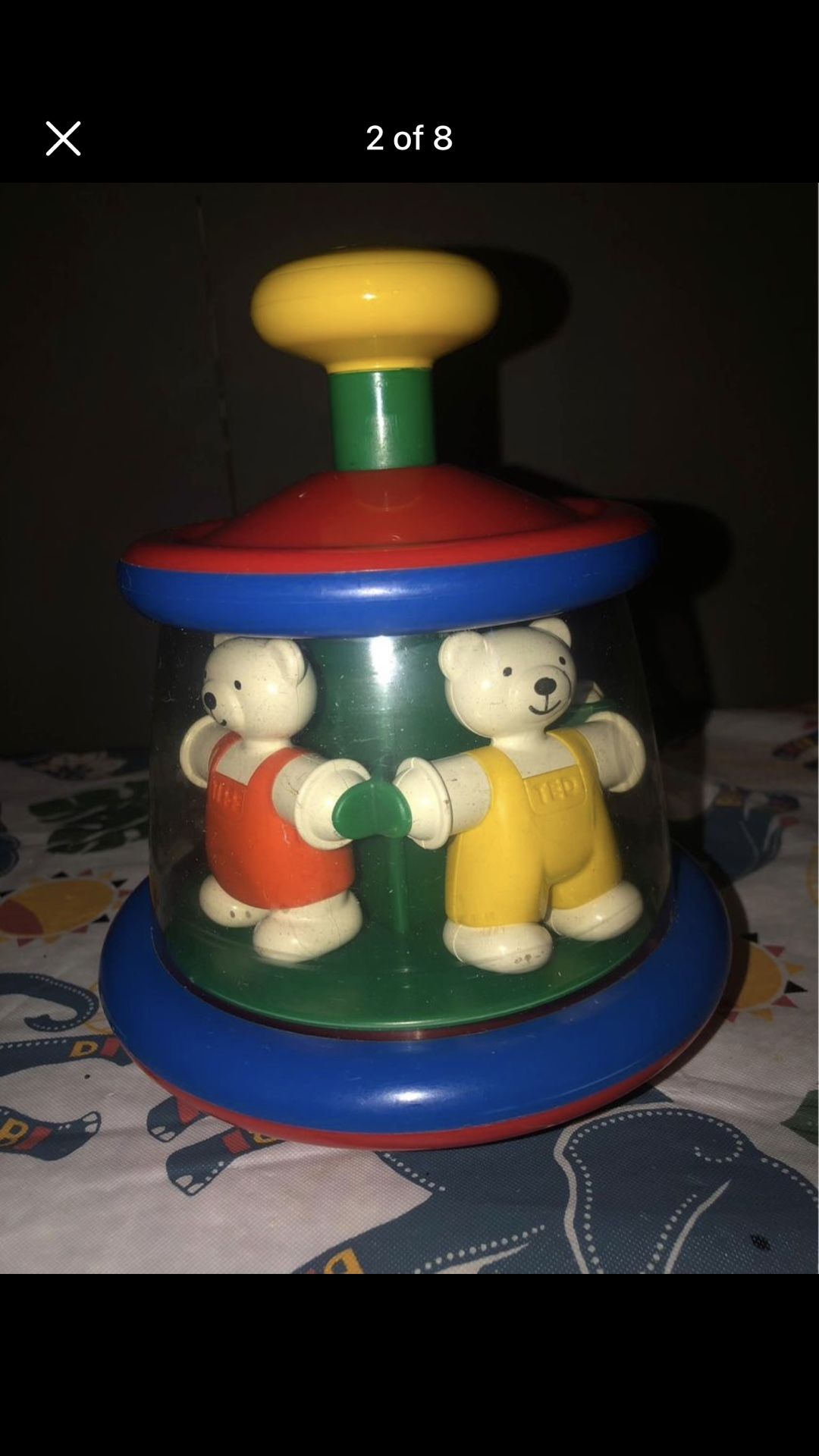 Vintage spinning top toy by Ambi toys from Holland