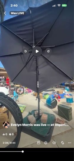 Huge big black umbrella with base
