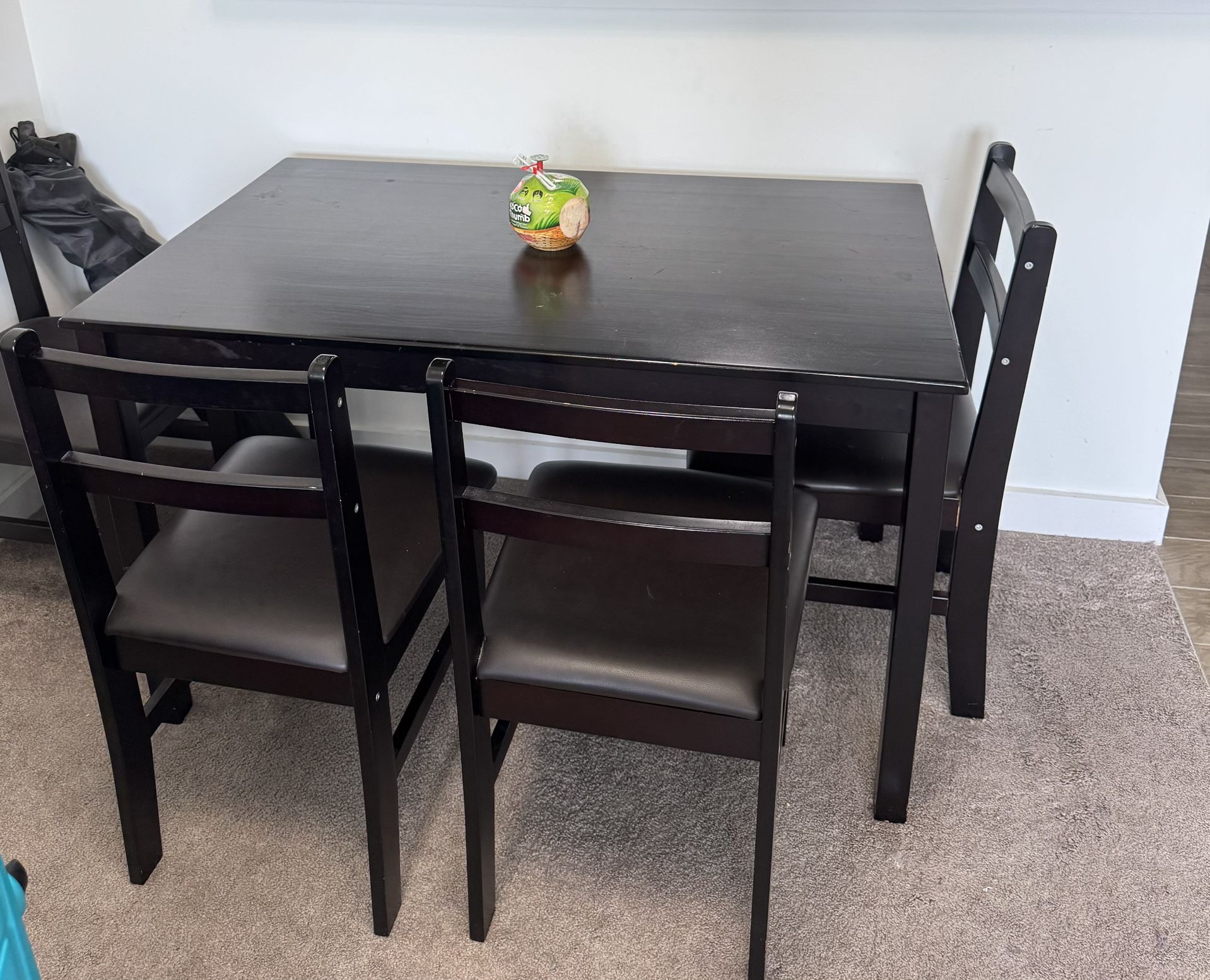 Sleek Black 4-Seater Dining Table – Stylish, Compact, & Comfortable