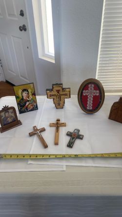 Collection of catholic religious icons and crosses collected from different churches