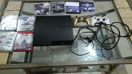 Ps3 con 8 juegos y 2 controles
