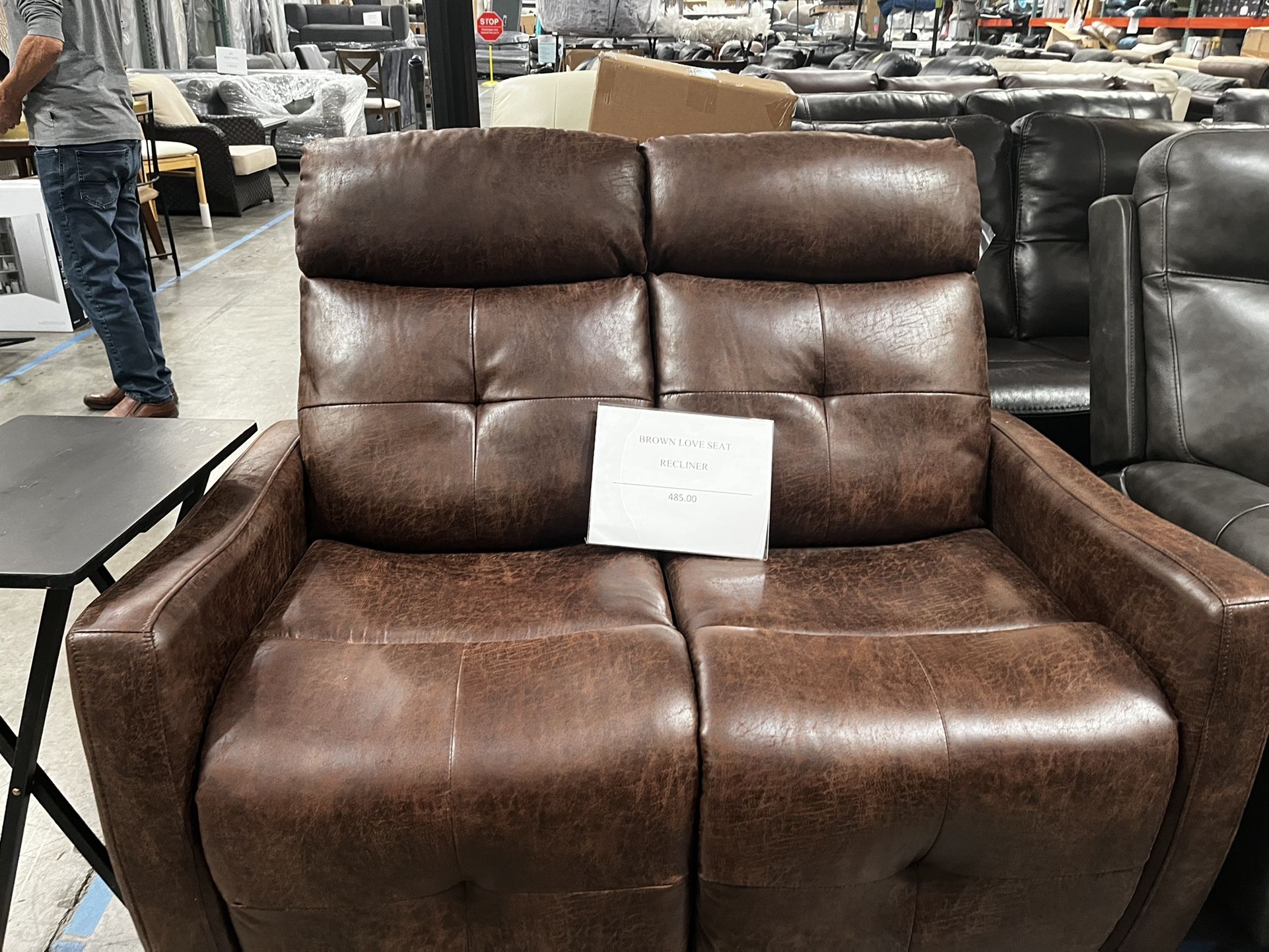 Brown leather loveseat recliner