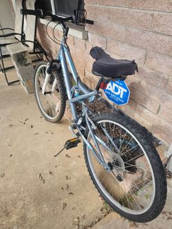 Woman Huffy trail-runner mountain bike