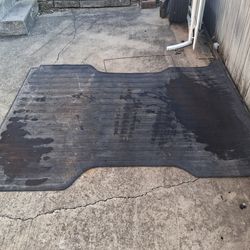 Rubber truck bed mat.