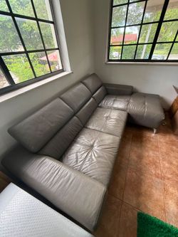 114" leather right facing sectional sofa