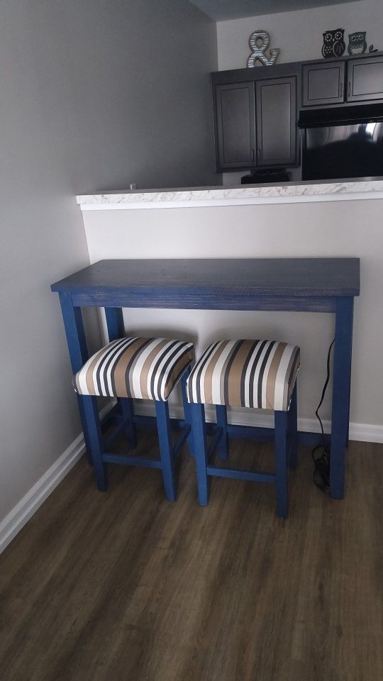Pub Style Table With 2 Upholstered Stools