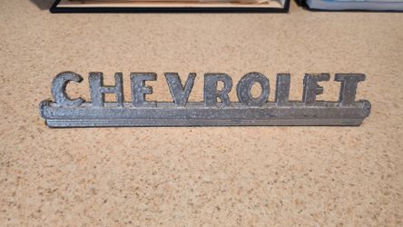1947 through 1954 Chevrolet hood side emblem