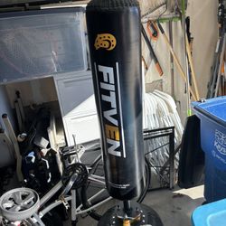 Punching Bag With Boxing Gloves