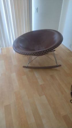 Brown leather rocking chair
