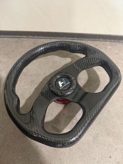 Real carbon fiber steering wheel with NRG quick release