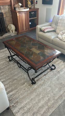 Rustic slate top coffee table with wrought iron base