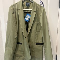 Under Armour men's blazer sport coat in green, made of spandex, polyamide, and cotton materials. 