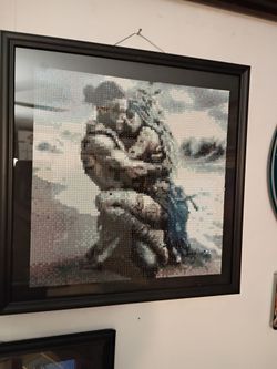 embracing couple on beach diamond art