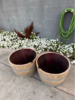 Half empty wine barrels for planter or any project available for sale..45