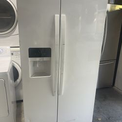 White side by side refrigerator with ice maker