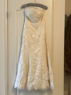 Vintage style pearl embroidered wedding gown.