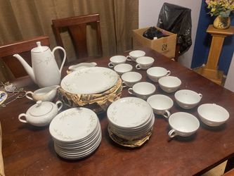 White Porcelain Dinnerware Set with Floral Pattern