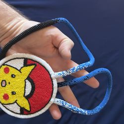 Hand crafted pokemon medallion