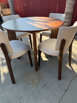 Dining wooden round table with 4 upholstery dining chairs with wooden frame included