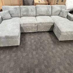 Light gray double chaise sectional.