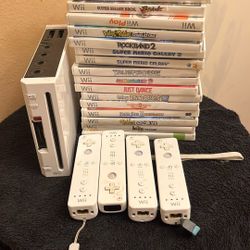 Wii Console, 4 Controllers, 17 Games, And Fitpad 