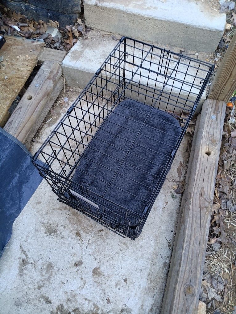A Small Cage For Cat Or Dog