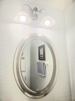 Bathroom vanity and light fixture