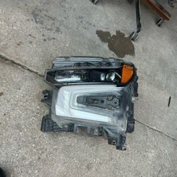 2022-24 CHEVY SILVERADO LF HEADLIGHT BLACK HOUSING OEM