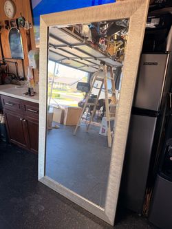 Gold trimmed mirror