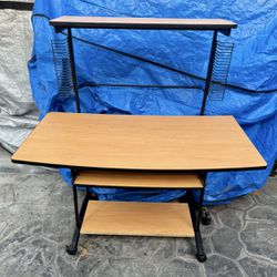 Wooden computer / writing / student desk w/ FREE office chair. Good condition.  measurements : 24 deep x  54L x 30 H (51 1/2 hutch) ;