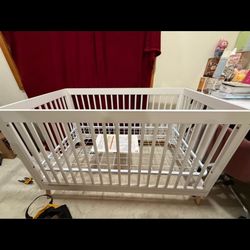 Delta Children Crib. Comes with a crib mattress
