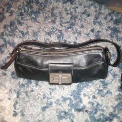 eBay
Ralph Lauren Black Leather Barrel Handbag 