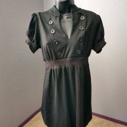 Be Bop large black stretchy material dress
Decorative buttons & stretchy middle band
