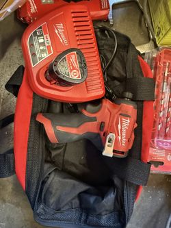 Milwaukee M12 12-Volt Lithium-Ion Compact Brushless Cordless 1/4 in. Impact Driver Kit w) 2.0 Ah Batteries, Charger & Tool Bag