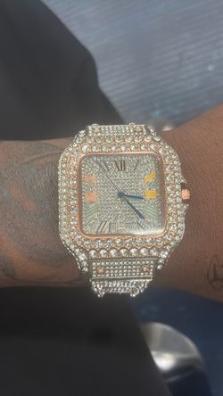 Iced out Cartier watch