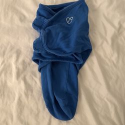 $5 S/M SwaddleMe by Ingenuity Original Swaddle, specifically in a blue color