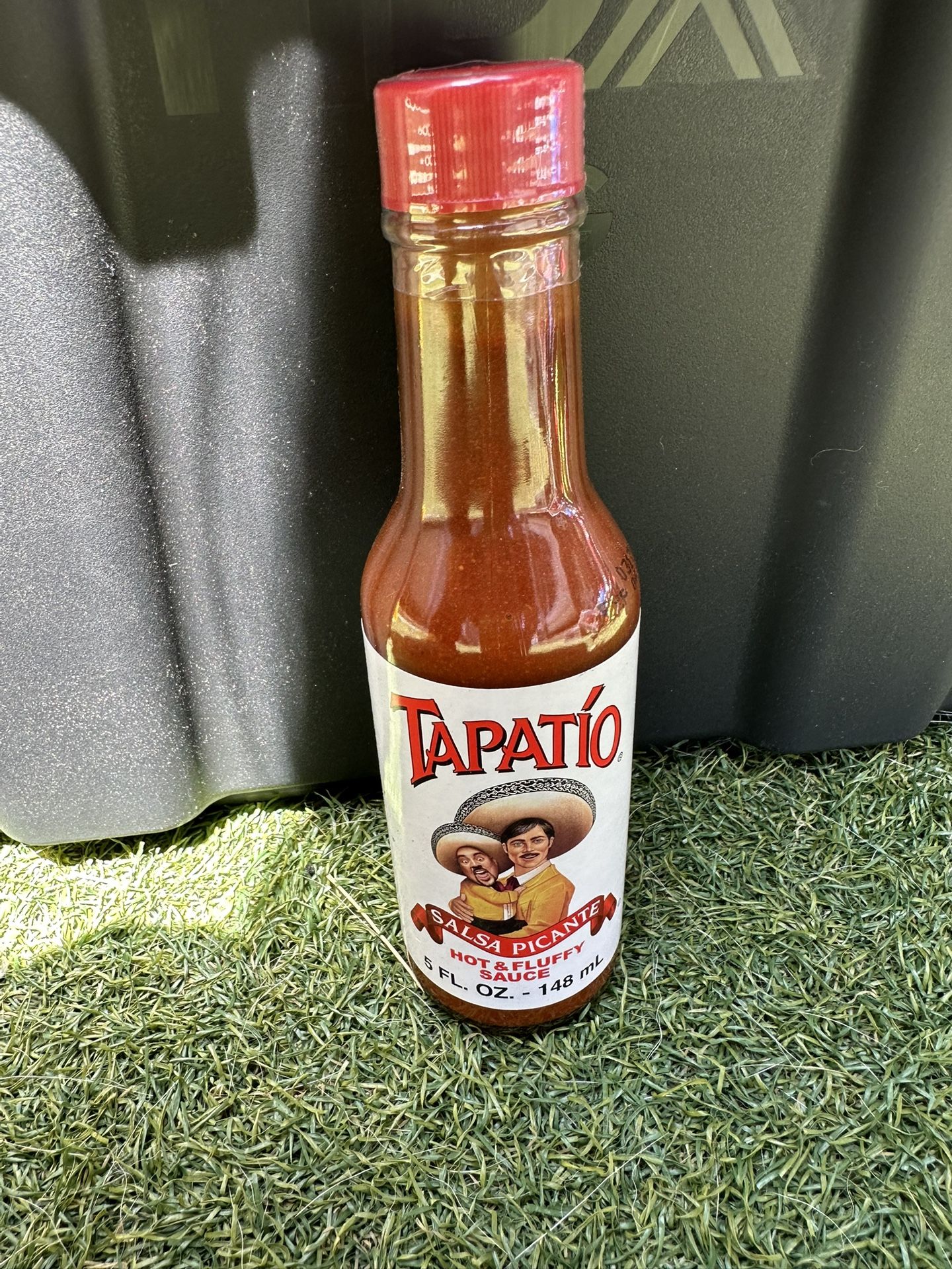 Fluffy Tapatio Bottle