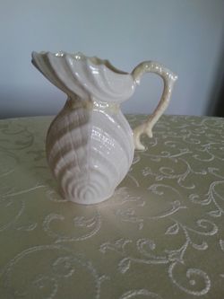 Belleek yellow nepture small pitcher