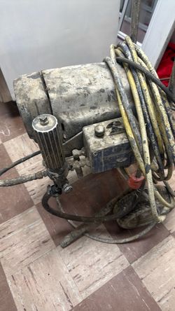 Commercial paint sprayer made by Graco