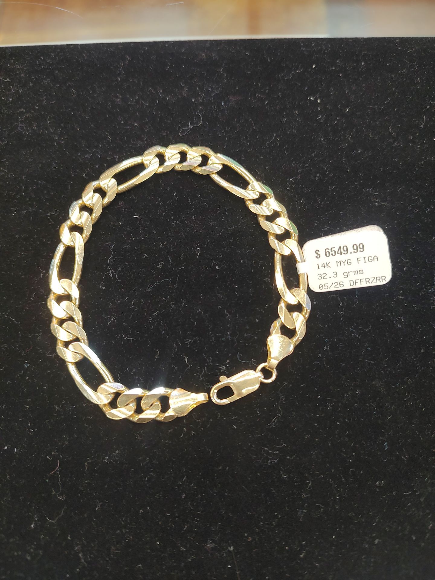 14k 32.3g gold Figaro bracelet 9 inch